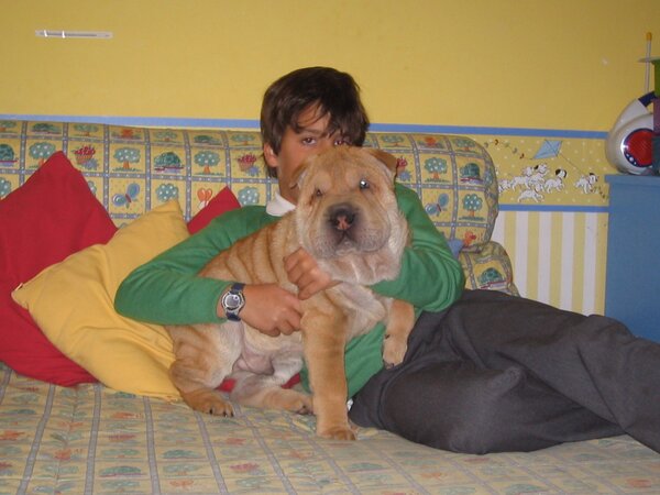 Young Fernando with Freddy the Shar Pei